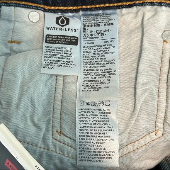 Levi’s 501 Mid Thigh Shorts in Salsa Center Dark Wash Size 33 - Picture 9 of 10